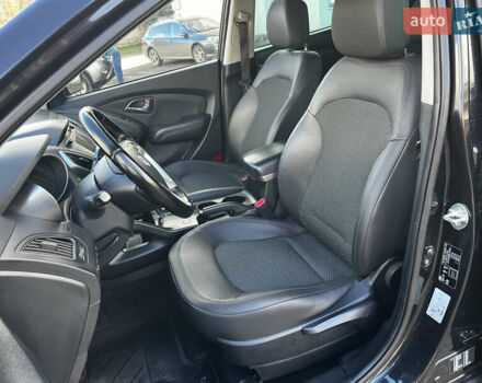 Чорний Хендай іх35, об'ємом двигуна 2 л та пробігом 226 тис. км за 12999 $, фото 19 на Automoto.ua