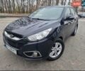 Чорний Хендай іх35, об'ємом двигуна 2 л та пробігом 119 тис. км за 12300 $, фото 1 на Automoto.ua