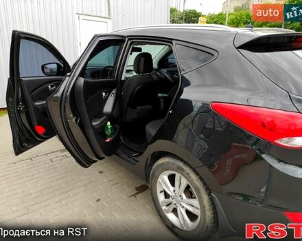 Черный Хендай их35, объемом двигателя 2 л и пробегом 290 тыс. км за 10500 $, фото 10 на Automoto.ua