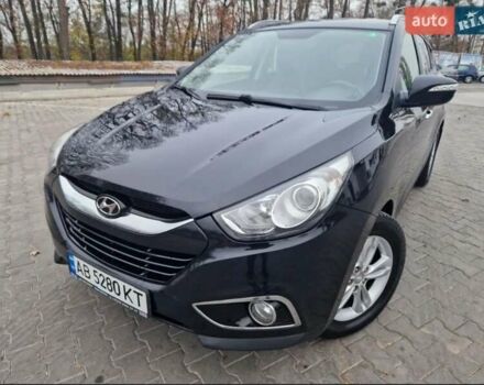 Чорний Хендай іх35, об'ємом двигуна 2 л та пробігом 119 тис. км за 12300 $, фото 6 на Automoto.ua