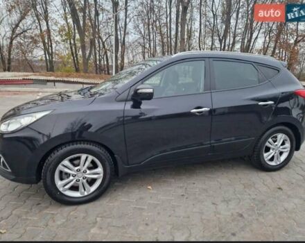 Чорний Хендай іх35, об'ємом двигуна 2 л та пробігом 119 тис. км за 12300 $, фото 8 на Automoto.ua