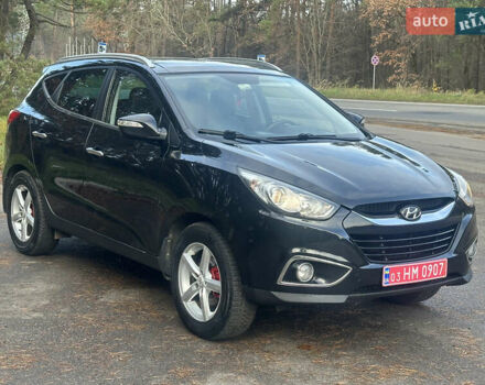 Чорний Хендай іх35, об'ємом двигуна 2 л та пробігом 240 тис. км за 12500 $, фото 3 на Automoto.ua