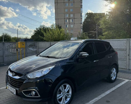Черный Хендай их35, объемом двигателя 2 л и пробегом 176 тыс. км за 12500 $, фото 6 на Automoto.ua