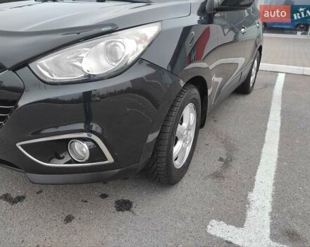 Черный Хендай их35, объемом двигателя 2 л и пробегом 249 тыс. км за 11900 $, фото 13 на Automoto.ua