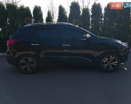 Чорний Хендай іх35, об'ємом двигуна 2.4 л та пробігом 213 тис. км за 12000 $, фото 3 на Automoto.ua
