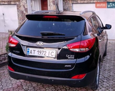 Черный Хендай их35, объемом двигателя 2 л и пробегом 264 тыс. км за 11900 $, фото 3 на Automoto.ua