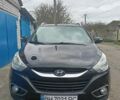 Черный Хендай их35, объемом двигателя 2 л и пробегом 190 тыс. км за 12800 $, фото 1 на Automoto.ua