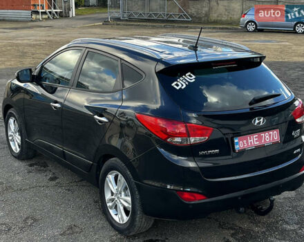 Чорний Хендай іх35, об'ємом двигуна 2 л та пробігом 226 тис. км за 12999 $, фото 12 на Automoto.ua