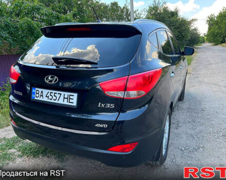 Черный Хендай их35, объемом двигателя 2 л и пробегом 120 тыс. км за 14000 $, фото 3 на Automoto.ua