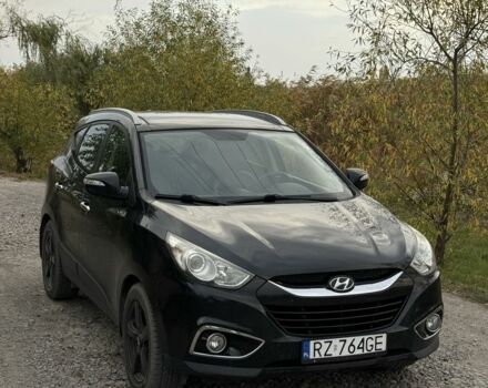 Чорний Хендай іх35, об'ємом двигуна 2 л та пробігом 237 тис. км за 7100 $, фото 2 на Automoto.ua