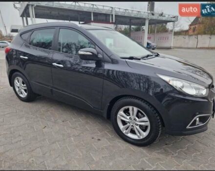 Чорний Хендай іх35, об'ємом двигуна 2 л та пробігом 119 тис. км за 12300 $, фото 10 на Automoto.ua