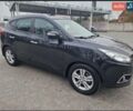 Чорний Хендай іх35, об'ємом двигуна 2 л та пробігом 119 тис. км за 12300 $, фото 10 на Automoto.ua