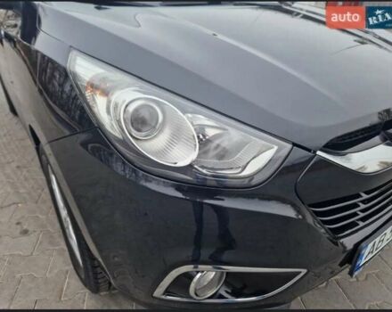 Чорний Хендай іх35, об'ємом двигуна 2 л та пробігом 119 тис. км за 12300 $, фото 17 на Automoto.ua