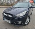 Чорний Хендай іх35, об'ємом двигуна 2 л та пробігом 119 тис. км за 12300 $, фото 4 на Automoto.ua