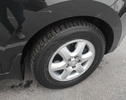 Черный Хендай их35, объемом двигателя 2 л и пробегом 249 тыс. км за 11900 $, фото 4 на Automoto.ua