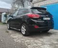 Черный Хендай их35, объемом двигателя 2 л и пробегом 190 тыс. км за 12800 $, фото 4 на Automoto.ua
