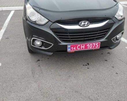 Черный Хендай их35, объемом двигателя 2 л и пробегом 249 тыс. км за 11900 $, фото 1 на Automoto.ua