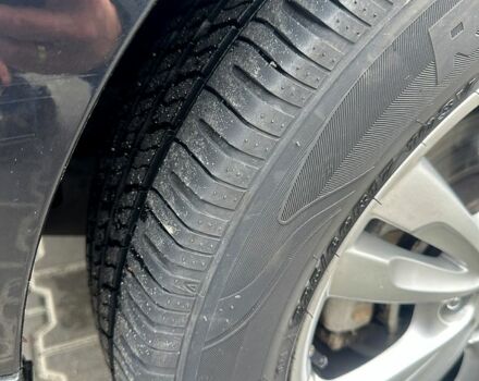 Чорний Хендай іх35, об'ємом двигуна 2 л та пробігом 116 тис. км за 10800 $, фото 4 на Automoto.ua