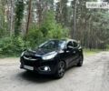 Чорний Хендай іх35, об'ємом двигуна 2 л та пробігом 147 тис. км за 12500 $, фото 1 на Automoto.ua