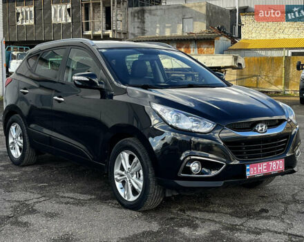 Чорний Хендай іх35, об'ємом двигуна 2 л та пробігом 226 тис. км за 12999 $, фото 2 на Automoto.ua