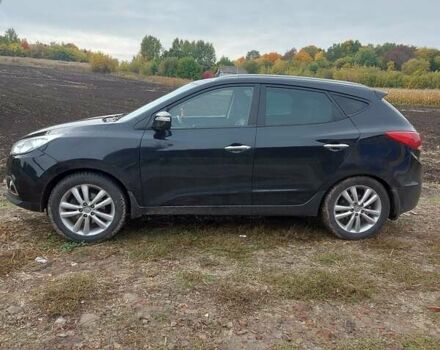 Черный Хендай их35, объемом двигателя 2 л и пробегом 230 тыс. км за 11300 $, фото 2 на Automoto.ua