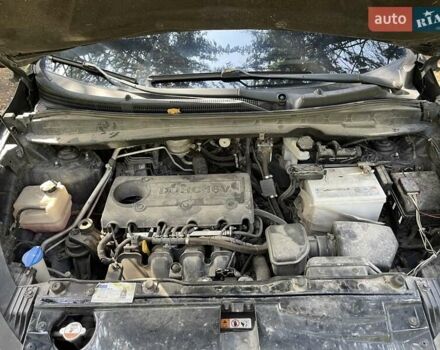 Чорний Хендай іх35, об'ємом двигуна 2 л та пробігом 287 тис. км за 10500 $, фото 7 на Automoto.ua