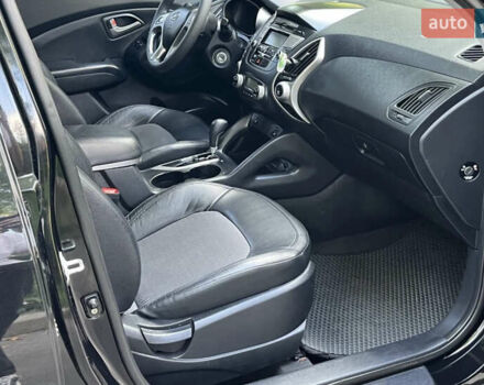 Чорний Хендай іх35, об'ємом двигуна 2 л та пробігом 196 тис. км за 12900 $, фото 18 на Automoto.ua