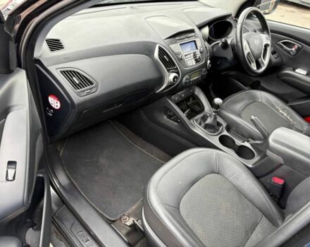 Чорний Хендай іх35, об'ємом двигуна 2 л та пробігом 141 тис. км за 4000 $, фото 12 на Automoto.ua