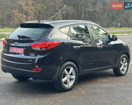 Чорний Хендай іх35, об'ємом двигуна 2 л та пробігом 240 тис. км за 12500 $, фото 9 на Automoto.ua