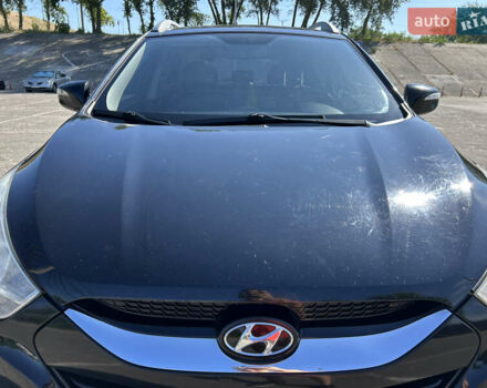 Чорний Хендай іх35, об'ємом двигуна 2 л та пробігом 196 тис. км за 12900 $, фото 6 на Automoto.ua