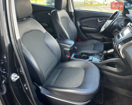 Чорний Хендай іх35, об'ємом двигуна 2 л та пробігом 225 тис. км за 12999 $, фото 35 на Automoto.ua