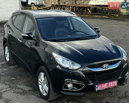 Чорний Хендай іх35, об'ємом двигуна 2 л та пробігом 225 тис. км за 12999 $, фото 9 на Automoto.ua