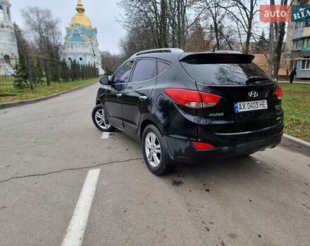 Чорний Хендай іх35, об'ємом двигуна 2 л та пробігом 188 тис. км за 10550 $, фото 1 на Automoto.ua