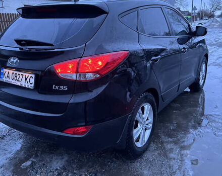 Чорний Хендай іх35, об'ємом двигуна 2 л та пробігом 252 тис. км за 11000 $, фото 6 на Automoto.ua