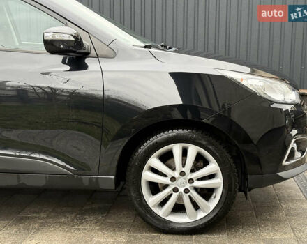 Чорний Хендай іх35, об'ємом двигуна 2 л та пробігом 206 тис. км за 13099 $, фото 16 на Automoto.ua