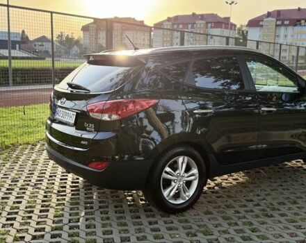 Черный Хендай их35, объемом двигателя 2 л и пробегом 265 тыс. км за 12100 $, фото 3 на Automoto.ua