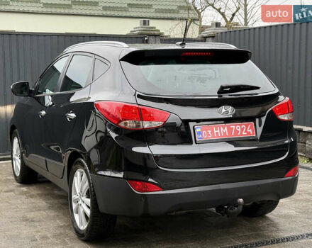 Чорний Хендай іх35, об'ємом двигуна 2 л та пробігом 206 тис. км за 13099 $, фото 29 на Automoto.ua