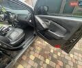 Чорний Хендай іх35, об'ємом двигуна 2 л та пробігом 210 тис. км за 12700 $, фото 6 на Automoto.ua