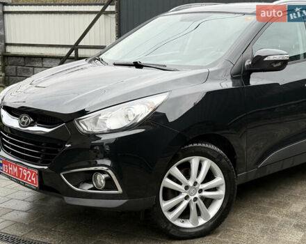 Чорний Хендай іх35, об'ємом двигуна 2 л та пробігом 206 тис. км за 13099 $, фото 28 на Automoto.ua