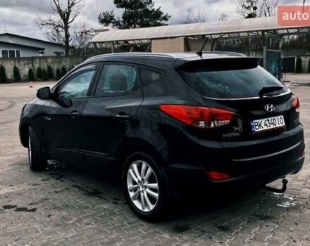 Черный Хендай их35, объемом двигателя 1.69 л и пробегом 290 тыс. км за 10999 $, фото 4 на Automoto.ua