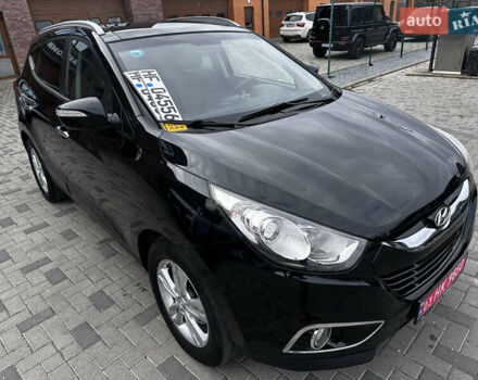 Черный Хендай их35, объемом двигателя 2 л и пробегом 197 тыс. км за 13650 $, фото 24 на Automoto.ua