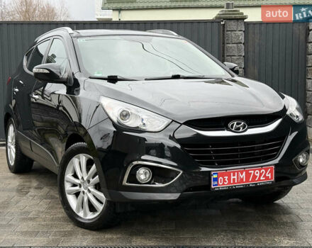 Чорний Хендай іх35, об'ємом двигуна 2 л та пробігом 206 тис. км за 13099 $, фото 9 на Automoto.ua