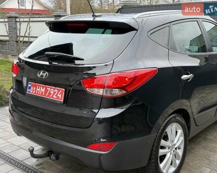 Чорний Хендай іх35, об'ємом двигуна 2 л та пробігом 206 тис. км за 13099 $, фото 36 на Automoto.ua