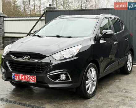 Чорний Хендай іх35, об'ємом двигуна 2 л та пробігом 206 тис. км за 13099 $, фото 13 на Automoto.ua