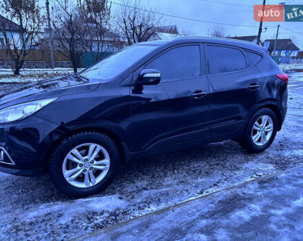 Чорний Хендай іх35, об'ємом двигуна 2 л та пробігом 252 тис. км за 11000 $, фото 1 на Automoto.ua