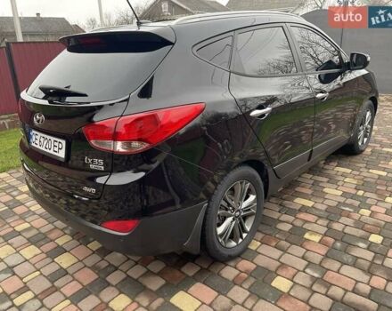 Чорний Хендай іх35, об'ємом двигуна 2 л та пробігом 210 тис. км за 12700 $, фото 2 на Automoto.ua