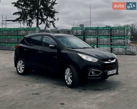 Черный Хендай их35, объемом двигателя 1.69 л и пробегом 290 тыс. км за 10999 $, фото 1 на Automoto.ua