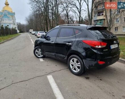 Чорний Хендай іх35, об'ємом двигуна 2 л та пробігом 188 тис. км за 11200 $, фото 5 на Automoto.ua