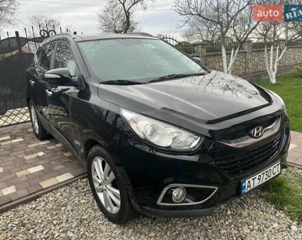 Чорний Хендай іх35, об'ємом двигуна 2 л та пробігом 181 тис. км за 12200 $, фото 4 на Automoto.ua