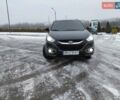 Черный Хендай их35, объемом двигателя 2 л и пробегом 184 тыс. км за 13500 $, фото 1 на Automoto.ua